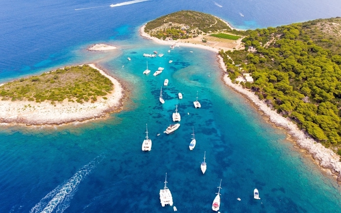 Yachts anchored near Budikovac Island, Vis, Croatia during yacht week.