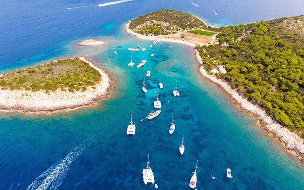 Yachts anchored near Budikovac Island, Vis, Croatia during yacht week.