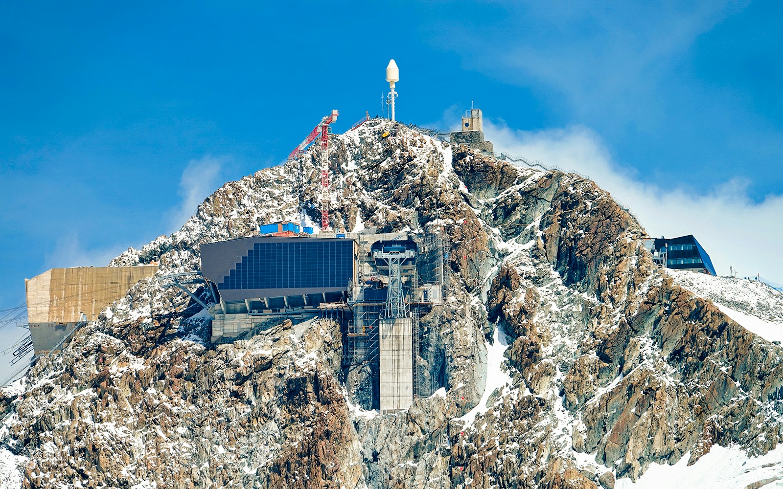 Klein Matterhorn cable car station atop snowy mountain, Zermatt, Switzerland.