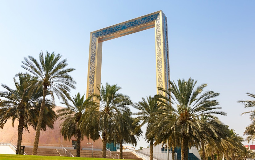 Dubai Frame with palm trees in United Arab Emirates.
