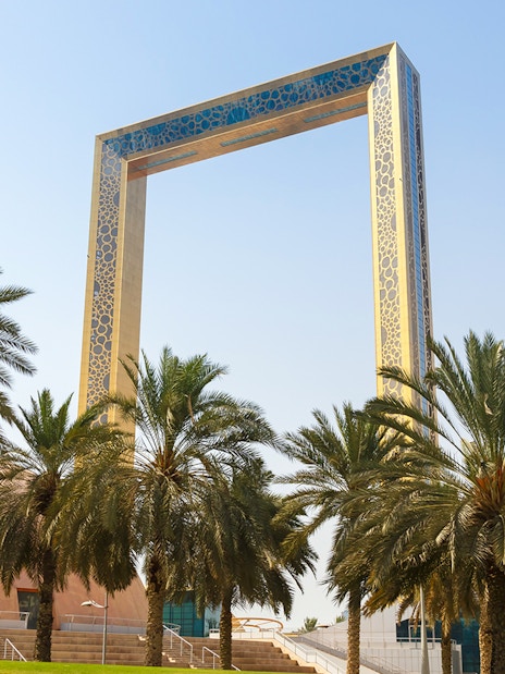 Dubai Frame with palm trees in United Arab Emirates.