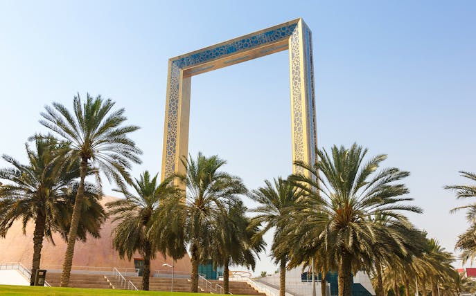 Dubai Frame with palm trees in United Arab Emirates.