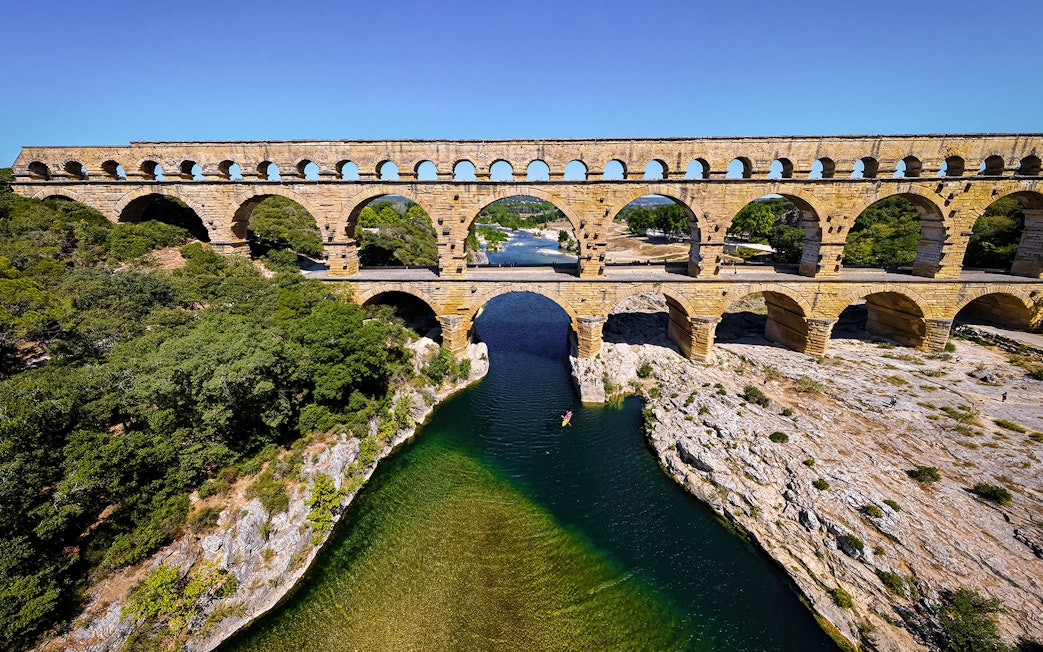 Pont du Gard aqueduct over river in Provence, France, seen on a guided tour from Avignon.