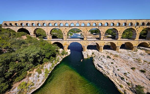 Pont du Gard aqueduct over river in Provence, France, seen on a guided tour from Avignon.