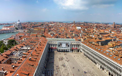 Aerial view of St. Mark's Square and Venice rooftops from St. Mark's Bell Tower.