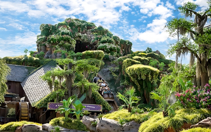 Tiana's Bayou Adventure ride with lush greenery at Walt Disney World Resort, Orlando.
