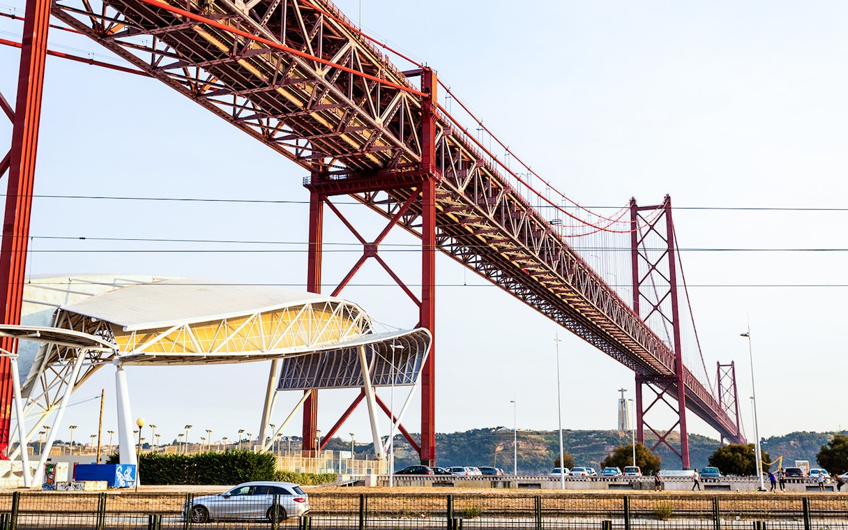 Lisbon's Ponte 25 de Abril bridge with Pilar 7 Experience viewpoint.