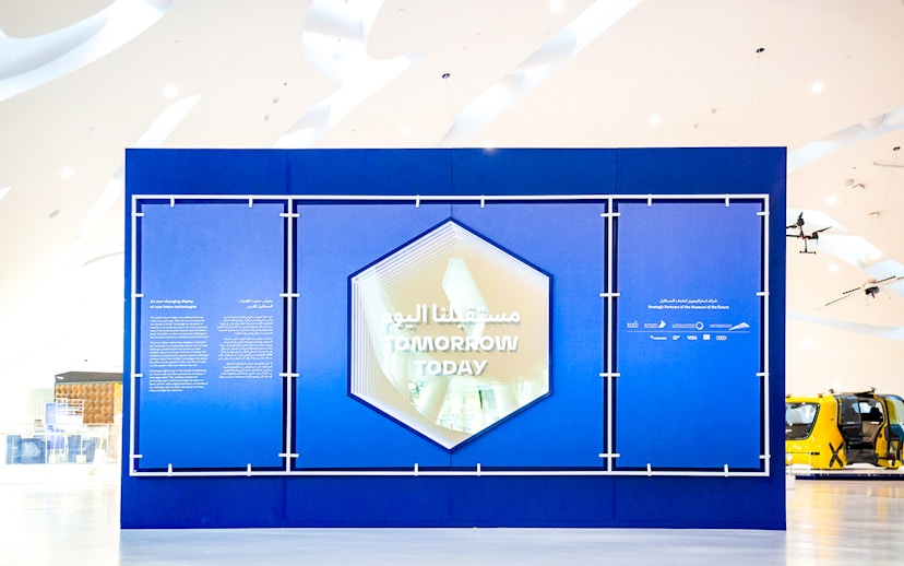Futuristic display inside Museum of the Future, Dubai, with "Tomorrow Today" text.