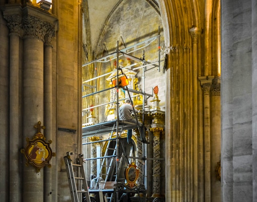 Notre Dame Cathedral restoration work with scaffolding in Paris, France.