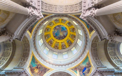 Dome interior of Napoleon's Tomb at the Paris Army Museum, featuring ornate frescoes.
