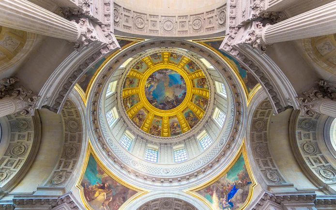Dome interior of Napoleon's Tomb at the Paris Army Museum, featuring ornate frescoes.