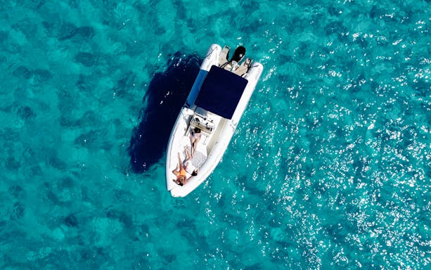Dinghy approaching Egadi Islands during day trip from Marsala, Italy.