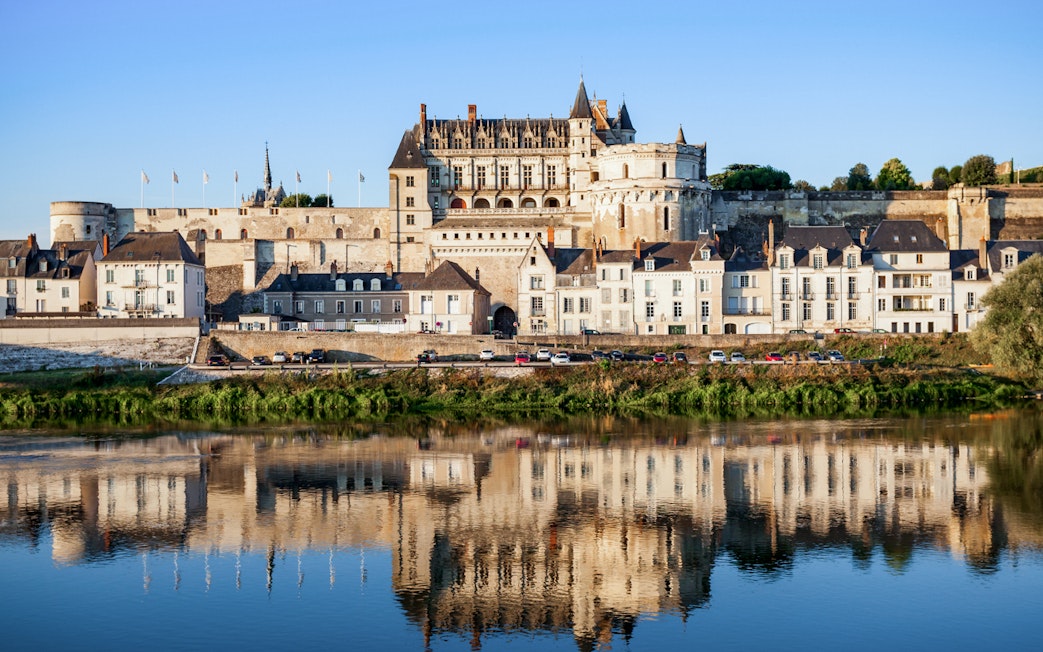 Royal Amboise Castle with reflection in the Loire River, France.