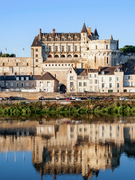 Royal Amboise Castle with reflection in the Loire River, France.