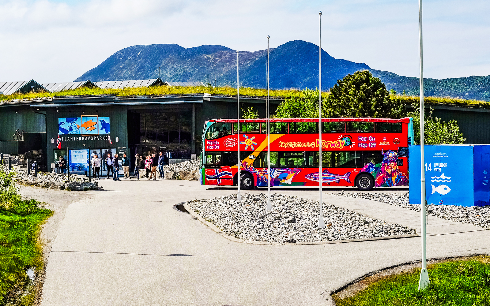 Alesund hop-on hop-off bus at Atlanterhavsparken Aquarium entrance, Norway.