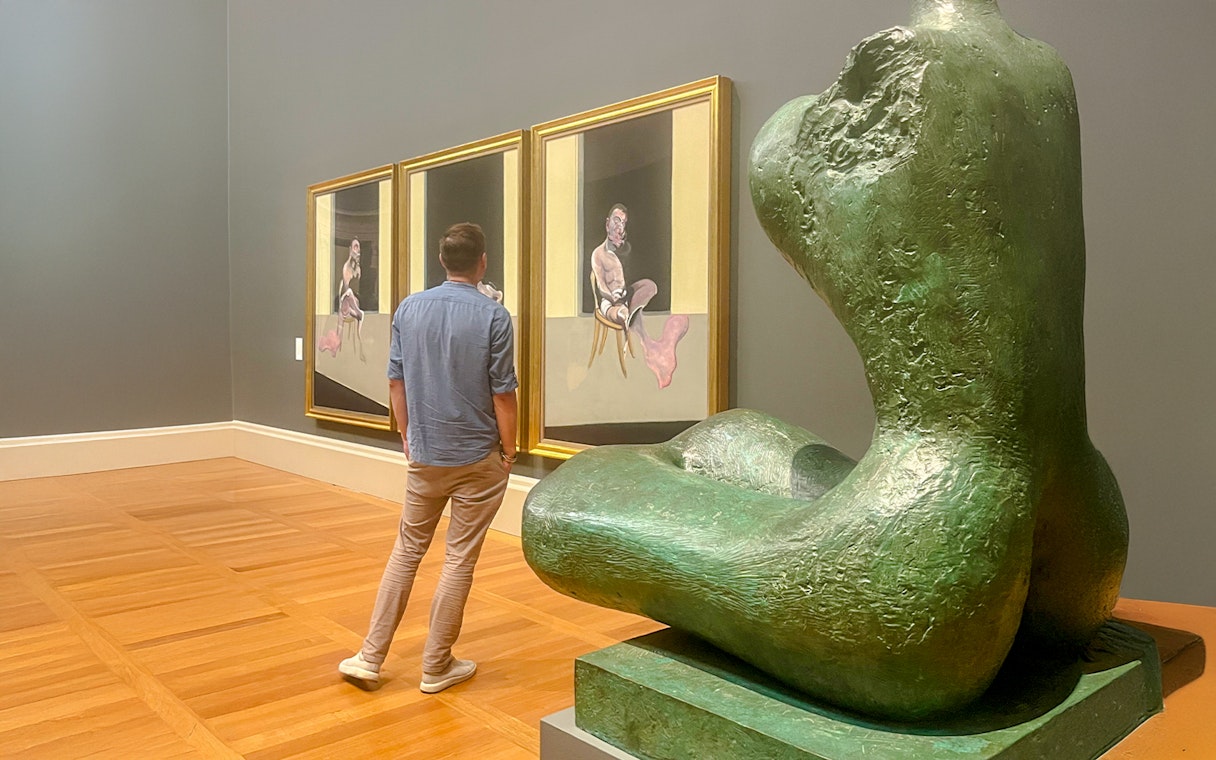 Guest viewing paintings and sculpture on the Tate Britain Discovery Tour.