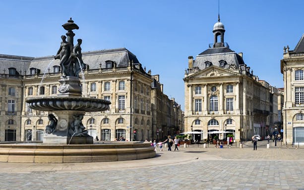 Place de la Bourse fountain and historic buildings in Bordeaux Old Town.