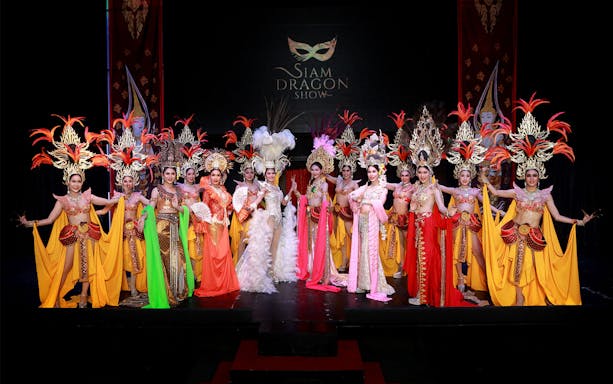 Performers in vibrant costumes at Siam Dragon Cabaret Show, Thailand.