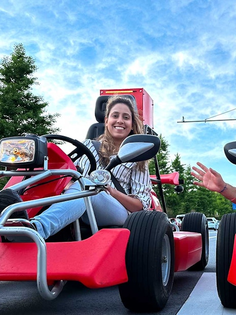 Tourists driving go-karts on the street in Akihabara, Tokyo.