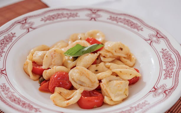 Orecchiette pasta with cherry tomatoes and basil, Polignano a Mare cooking class.