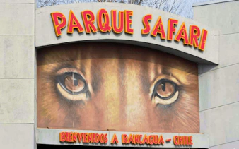 Parque Safari entrance with lion mural, Rancagua, Chile.