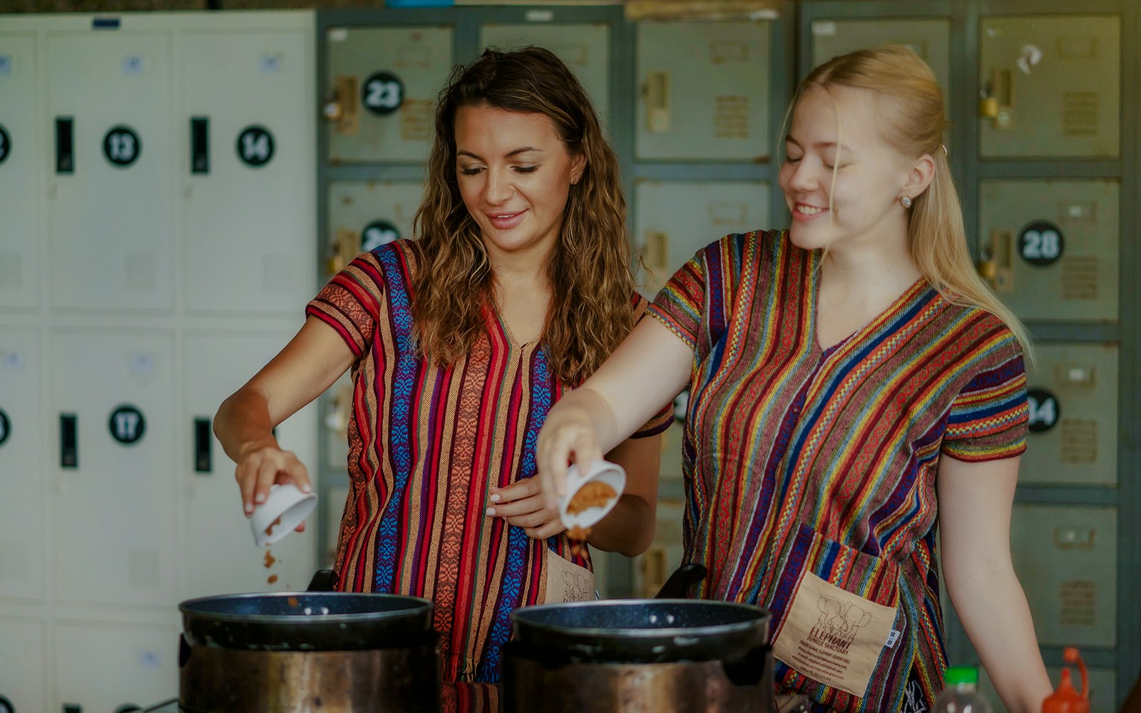 Women cooking at Elephant Jungle Sanctuary, Phuket, Thailand.