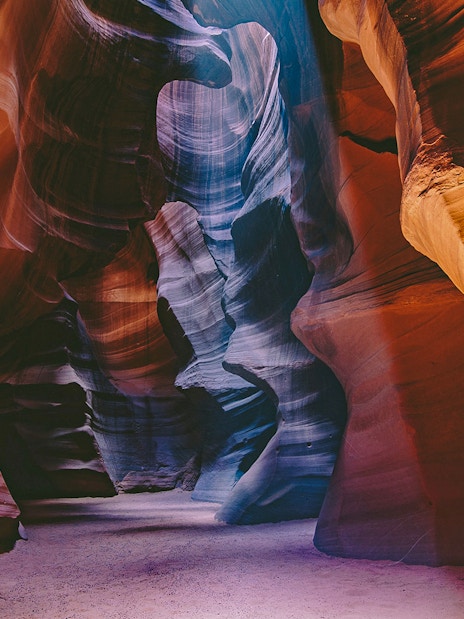 Upper Antelope Canyon's swirling sandstone walls in vibrant colors.