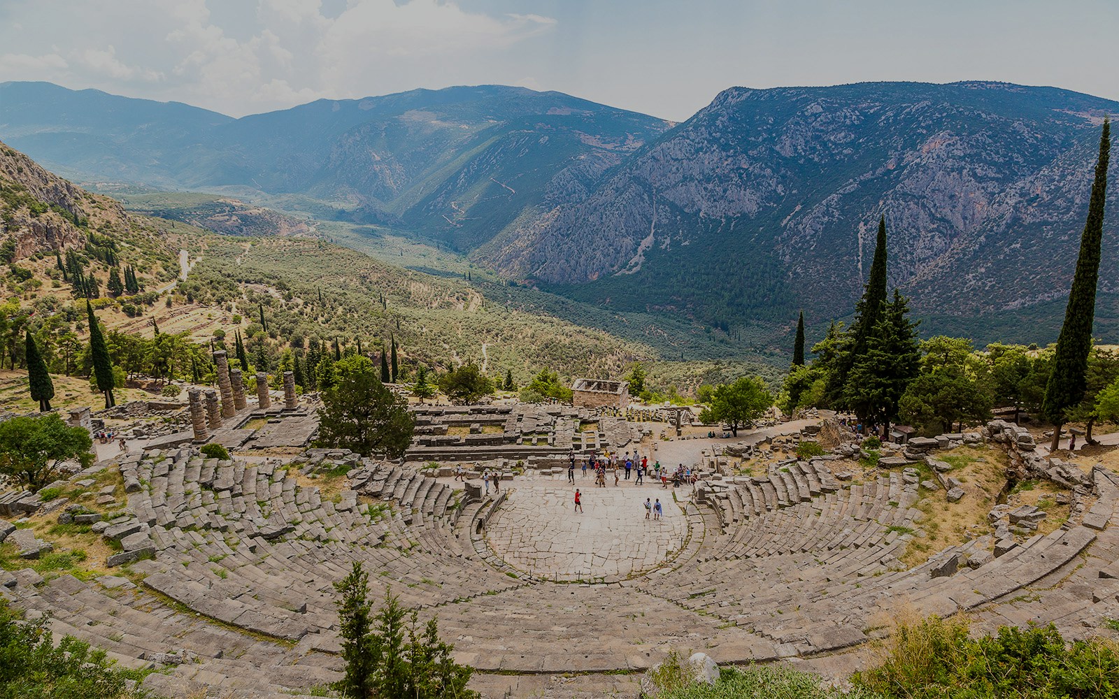 Theater of Delphi with mountainous landscape in the background, Delphi Archaeological Site, Greece.
