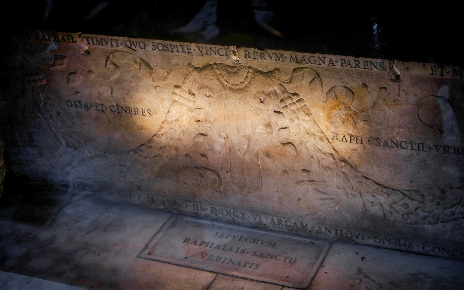 Tomb of Raphael with Latin inscriptions at the Pantheon in Rome.