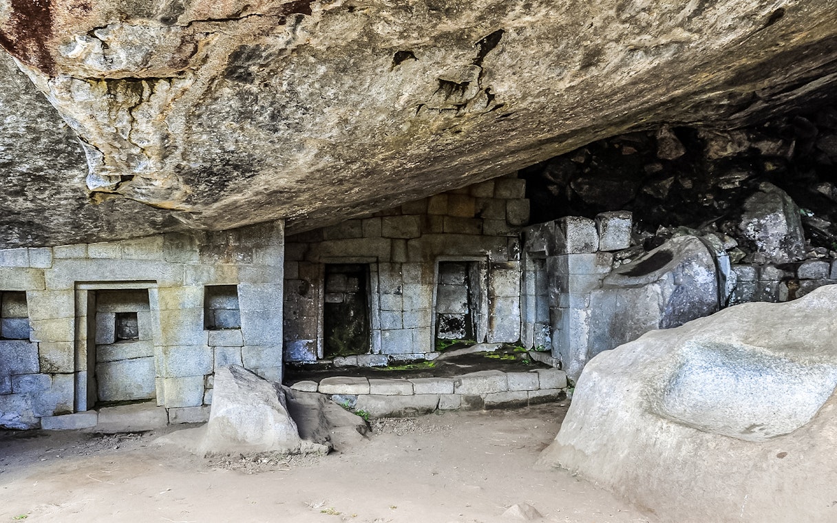 Great Cave stone structures at Machu Picchu, Peru.