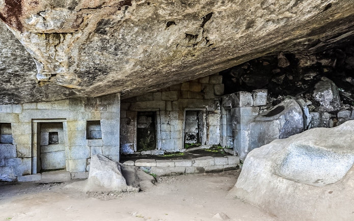 Great Cave stone structures at Machu Picchu, Peru.