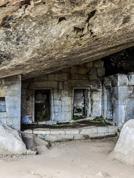 Great Cave stone structures at Machu Picchu, Peru.