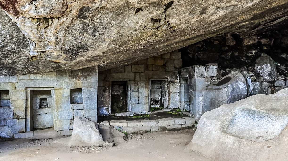 Great Cave stone structures at Machu Picchu, Peru.