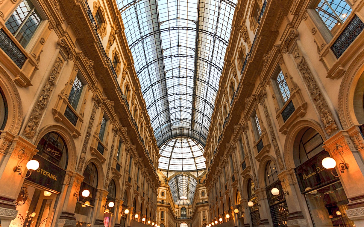 Galleria Vittorio Emanuele II's ornate interior and glass ceiling in Milan.