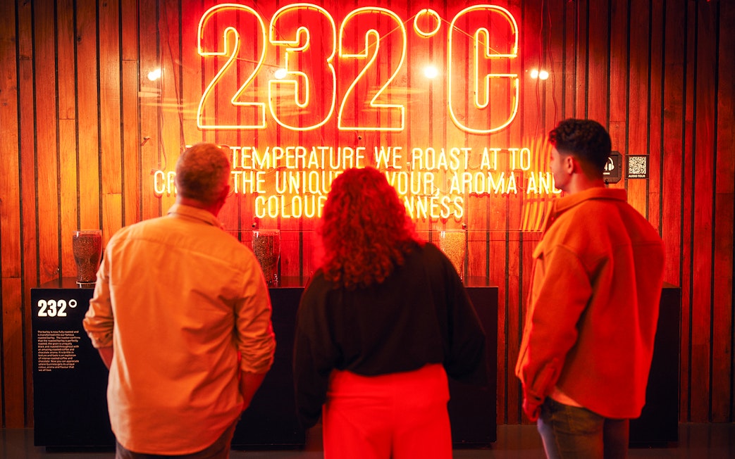 Guests viewing the 232°C roasting exhibit at the Guinness Storehouse.