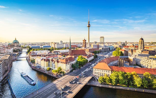 Berlin skyline with TV Tower and Berlin Cathedral along the Spree River.