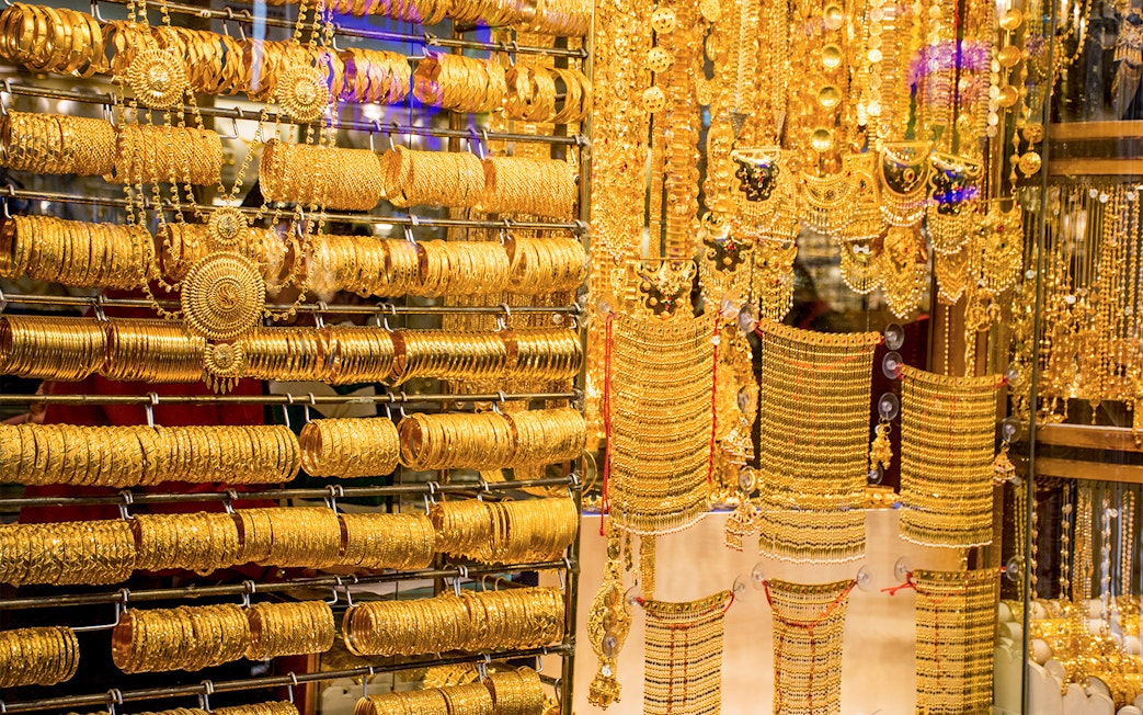 Gold jewelry display at Dubai Gold Souk during half-day sightseeing tour.