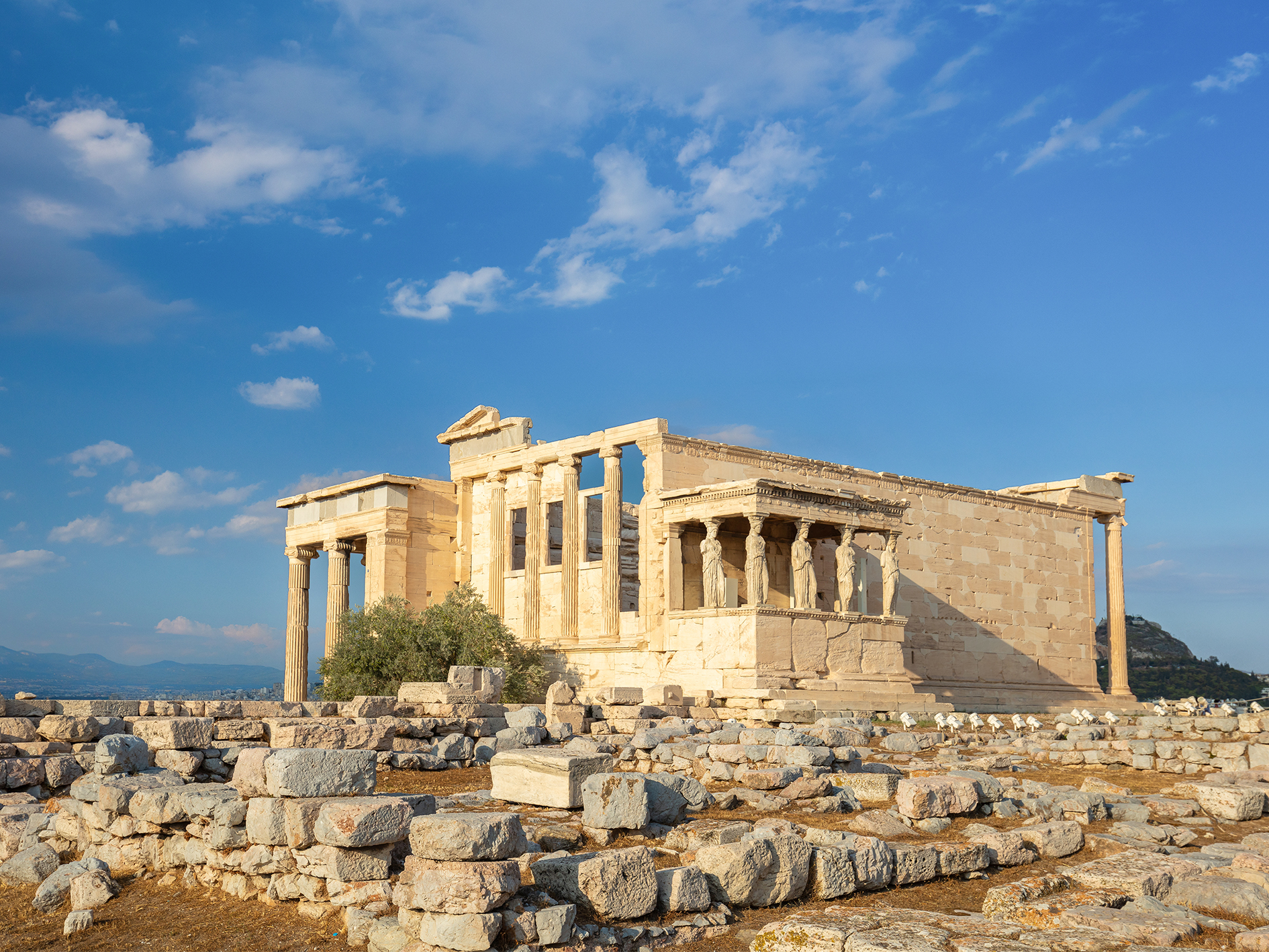 Ancient Greek History - statues of caryatids on the Parthenon on the hill of the Acropolis, Athens, Greece, Europe