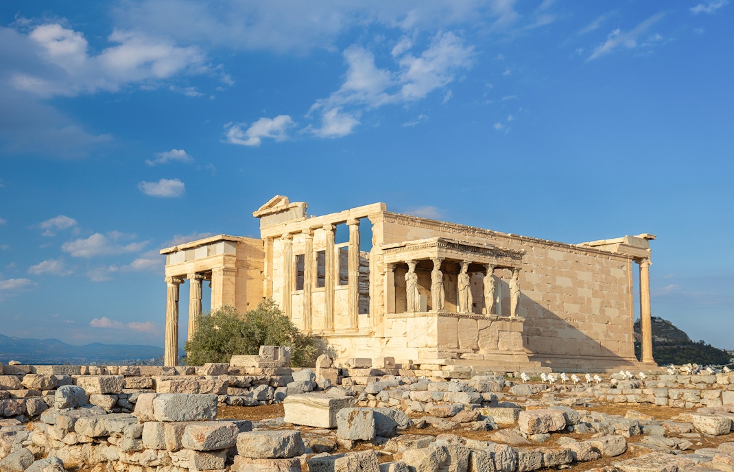 Ancient Greek History - statues of caryatids on the Parthenon on the hill of the Acropolis, Athens, Greece, Europe