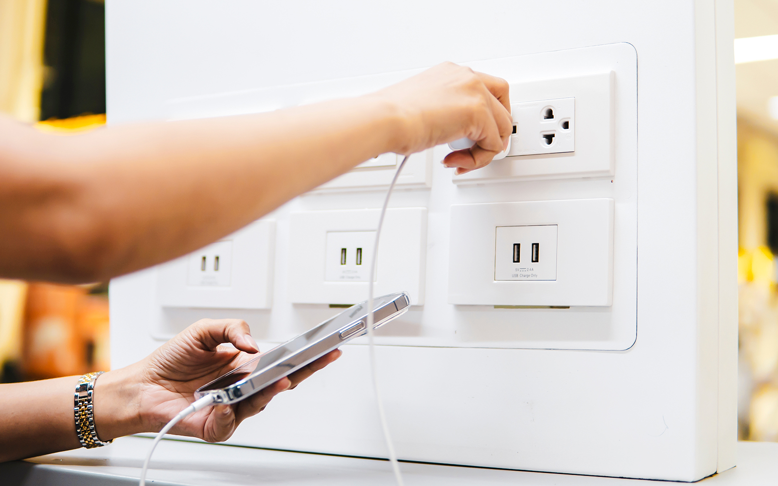 Charging phone at Jardin Majorelle station, Marrakech.