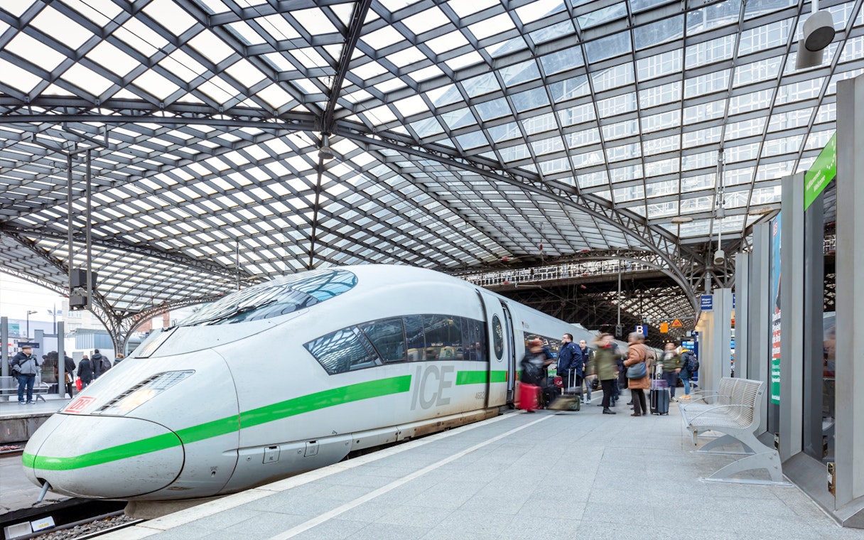 Passengers boarding ICE train at German station for Interrail Germany Mobile Pass Flex.