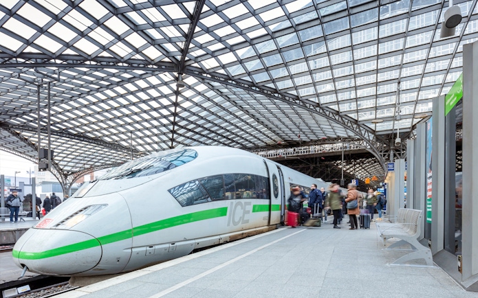 Passengers boarding ICE train at German station for Interrail Germany Mobile Pass Flex.