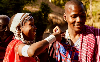 Maasai villagers in traditional attire during a cultural dance in Zanzibar.