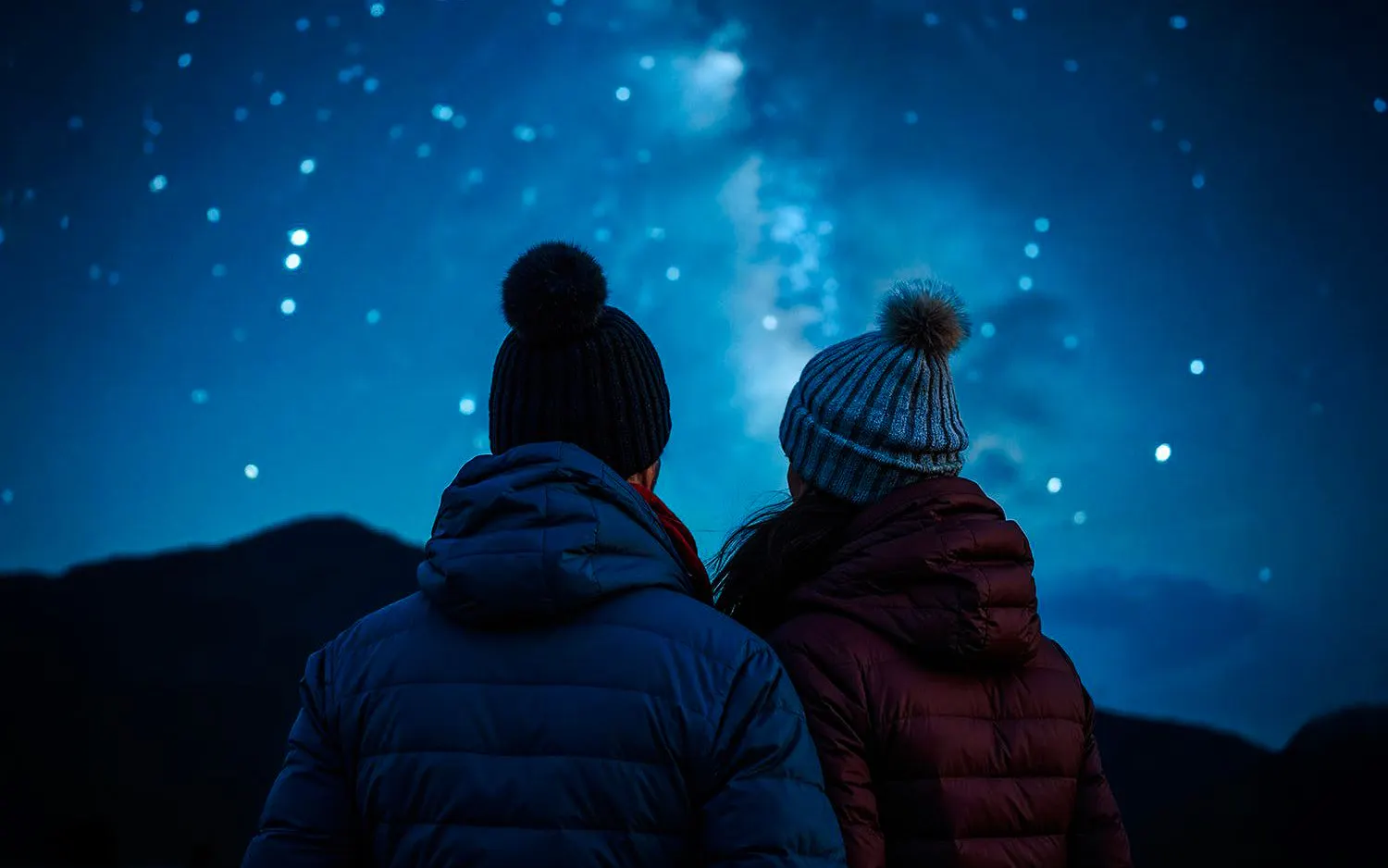 Guests stargazing on Mount Teide under a clear night sky.