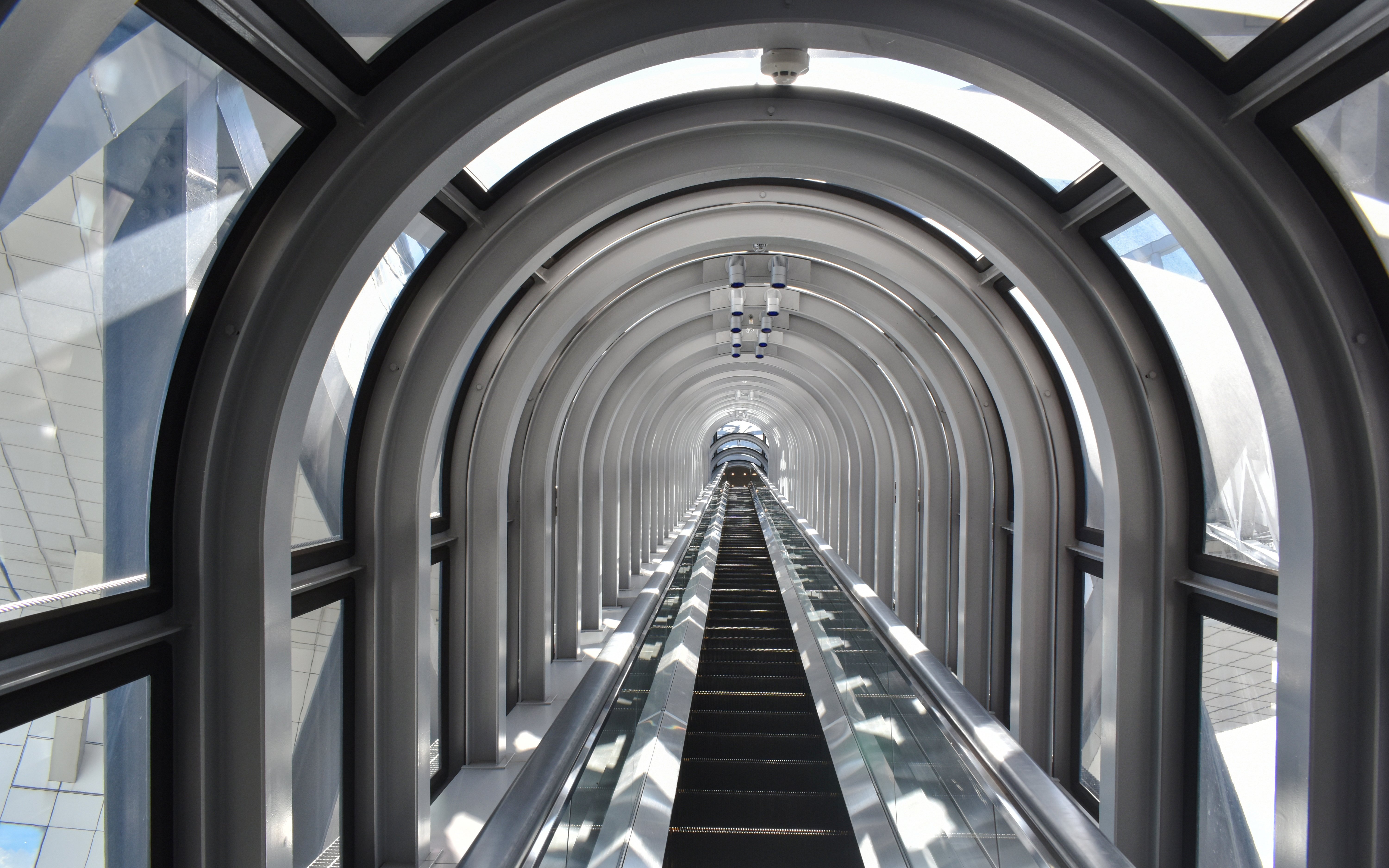Escalator inside the Umeda Sky Building in Osaka, Japan.