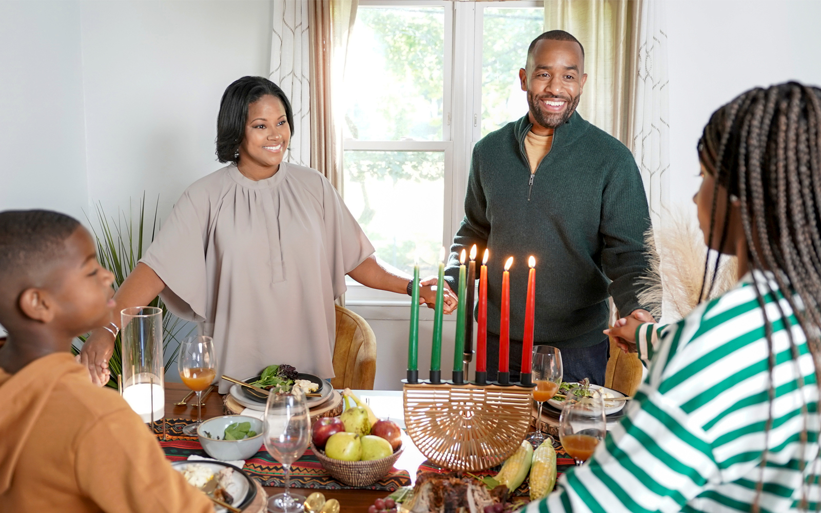  During Kwanzaa, a candle on the kinara is lit each day to represent one of the seven principles