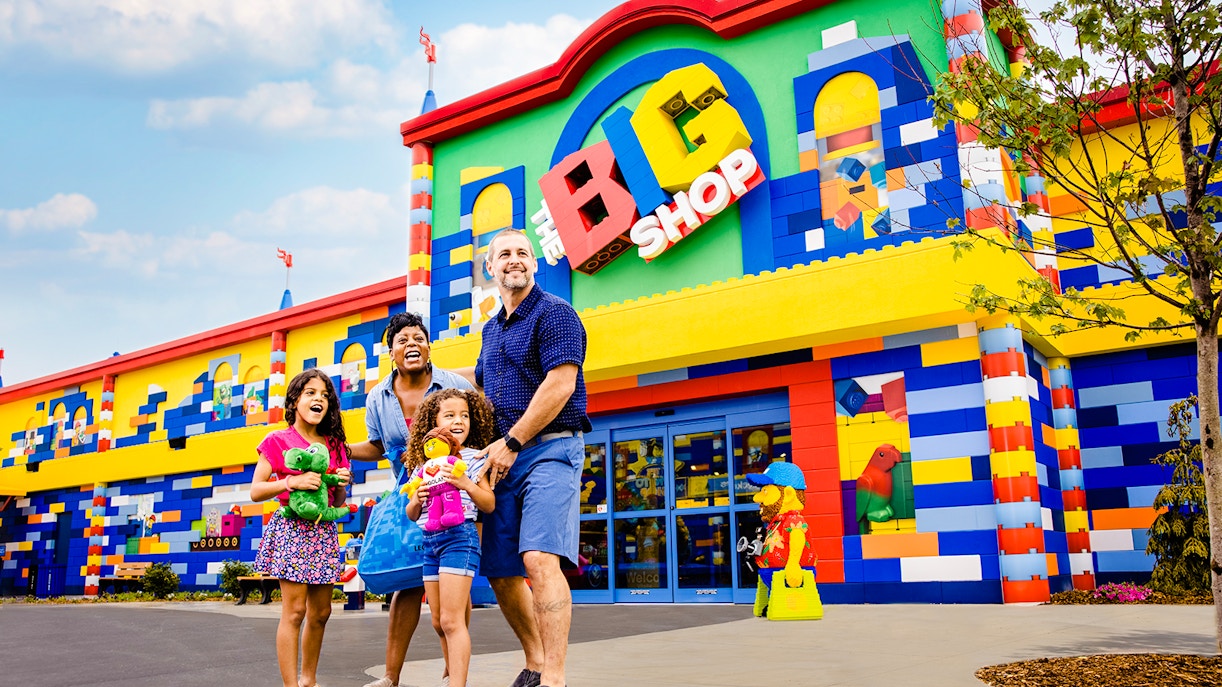 Guests enjoying the colorful entrance of The Big Shop at Legoland, New York.