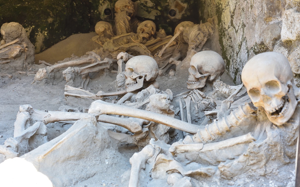 Skeletons preserved in ash at Herculaneum archaeological site near Naples, Italy.