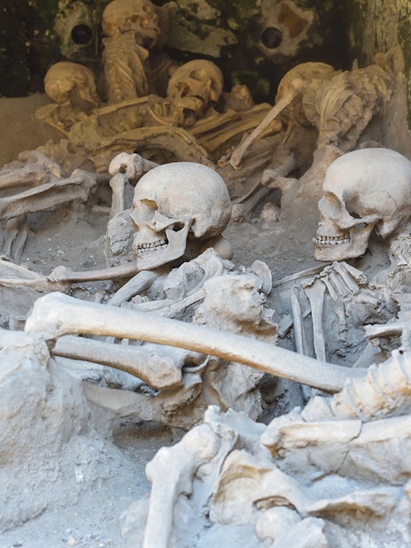 Skeletons preserved in ash at Herculaneum archaeological site near Naples, Italy.