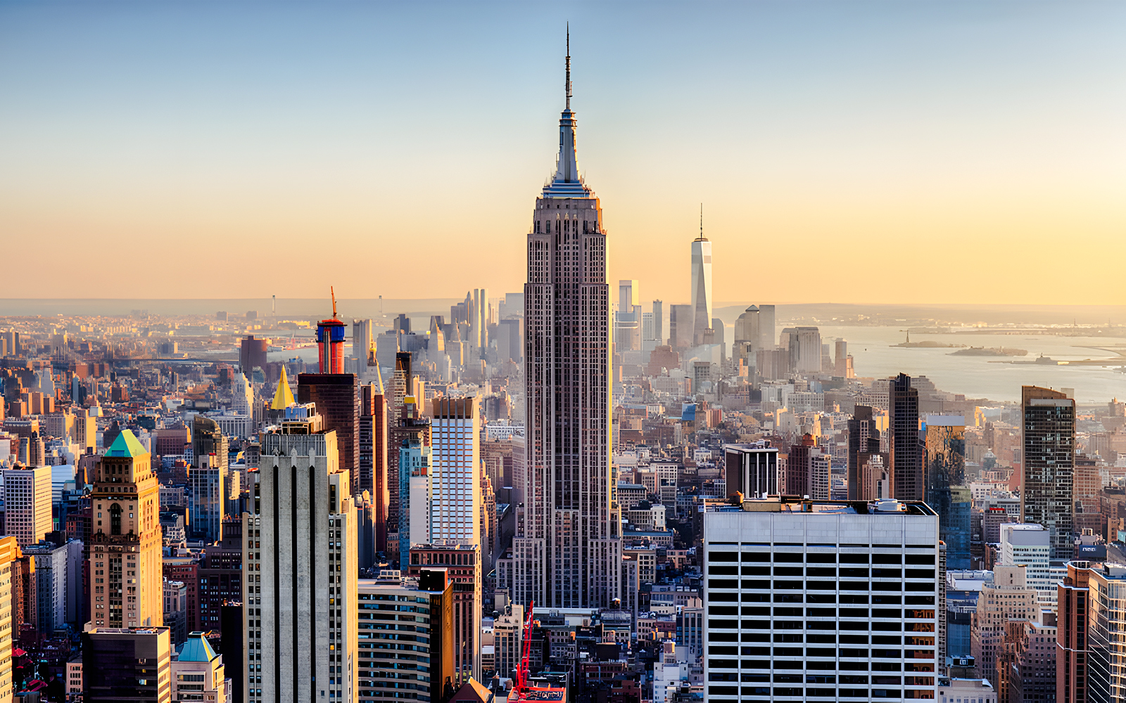 Aerial view of New York City skyline featuring the Empire State Building.